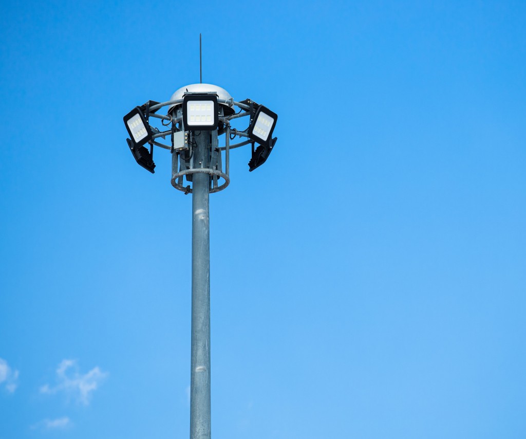 Exterior LED floodlights with PIR motion sensor securing a yard