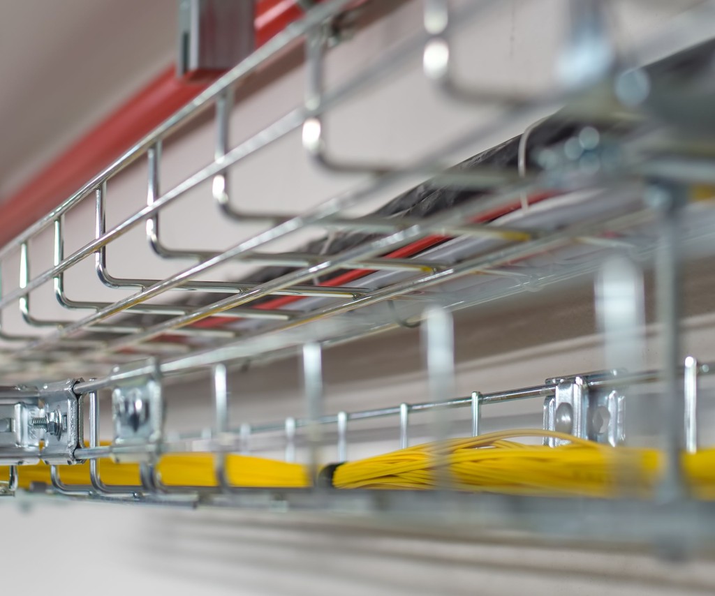 Network cables running through containment trays