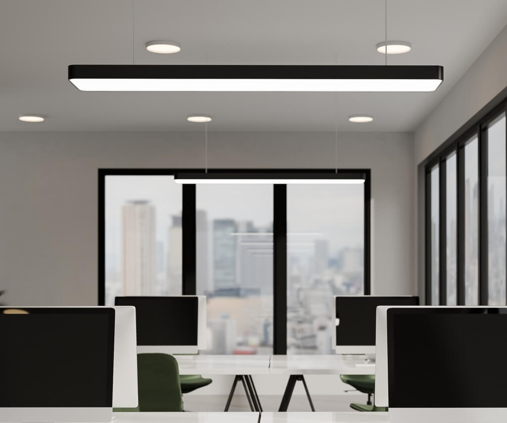 Open plan office with suspended linear LED lighting, designed for low glare workspaces