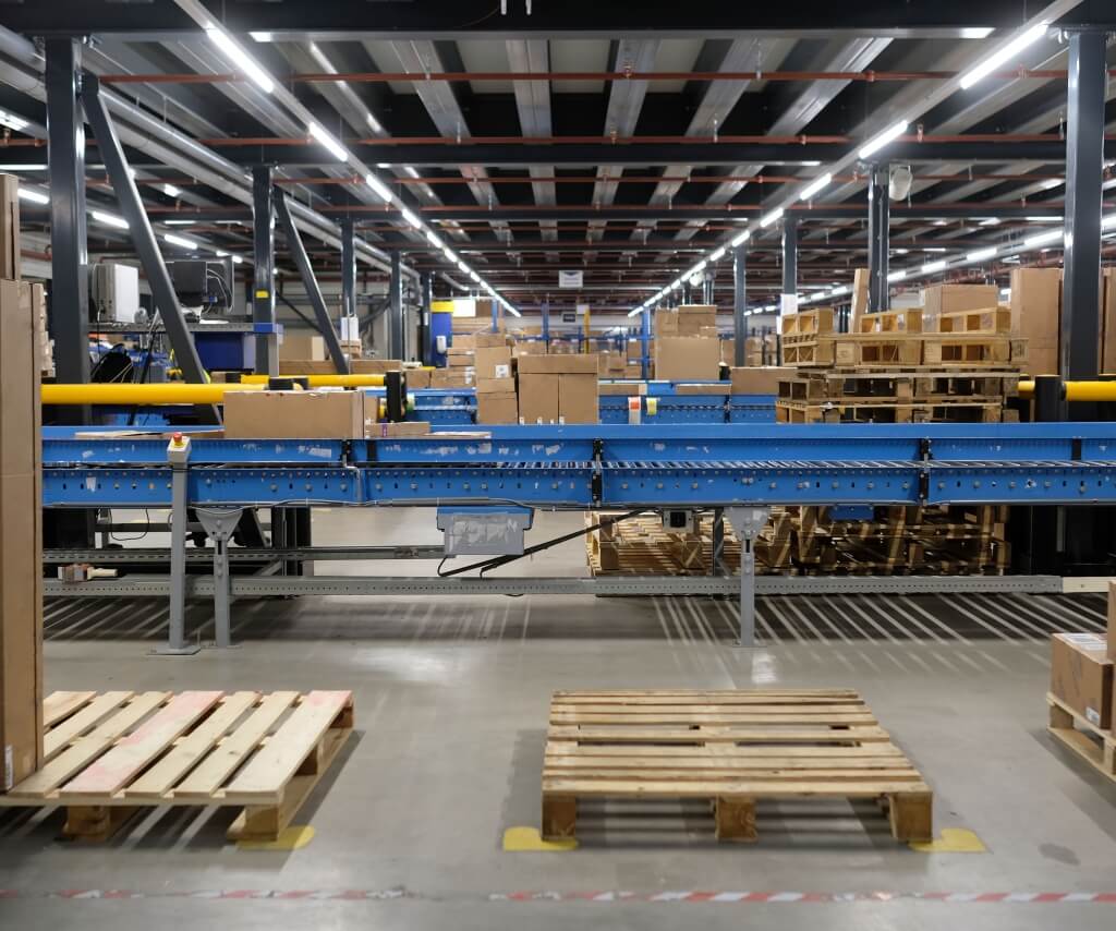 Warehouse conveyor area LED lighting, consistent light for packing and sorting