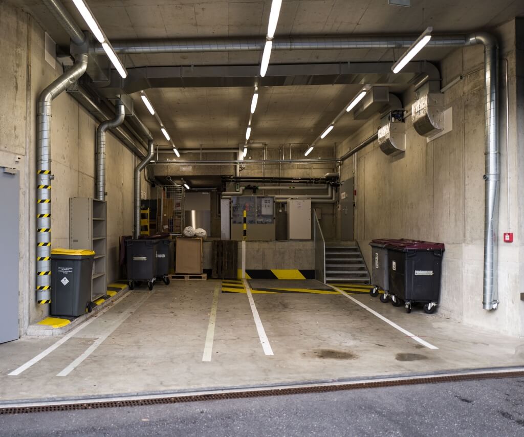 LED linear lighting in service bay and plant area, practical maintenance lighting