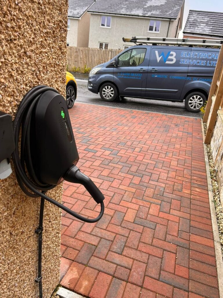 Home EV charger installation at the side of the house