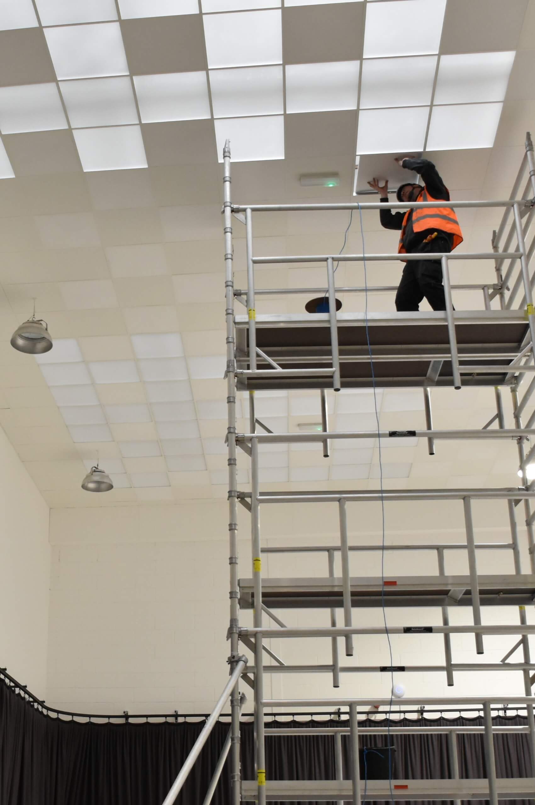 WB Engineer installing commercial grade lighting