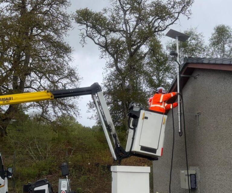 WB engineer installing connectivity infrastructure at an operational Scottish site