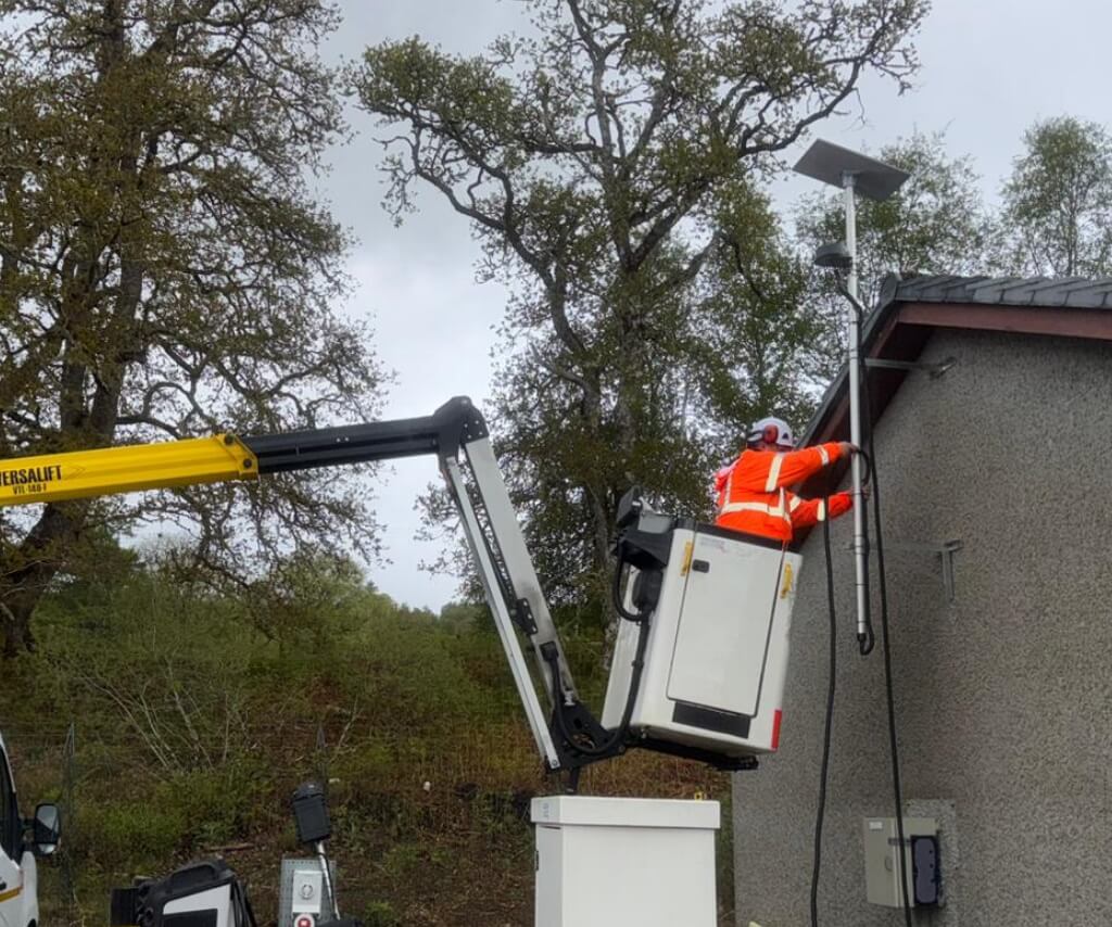 WB Electrical engineer installing 4G/5G antennas