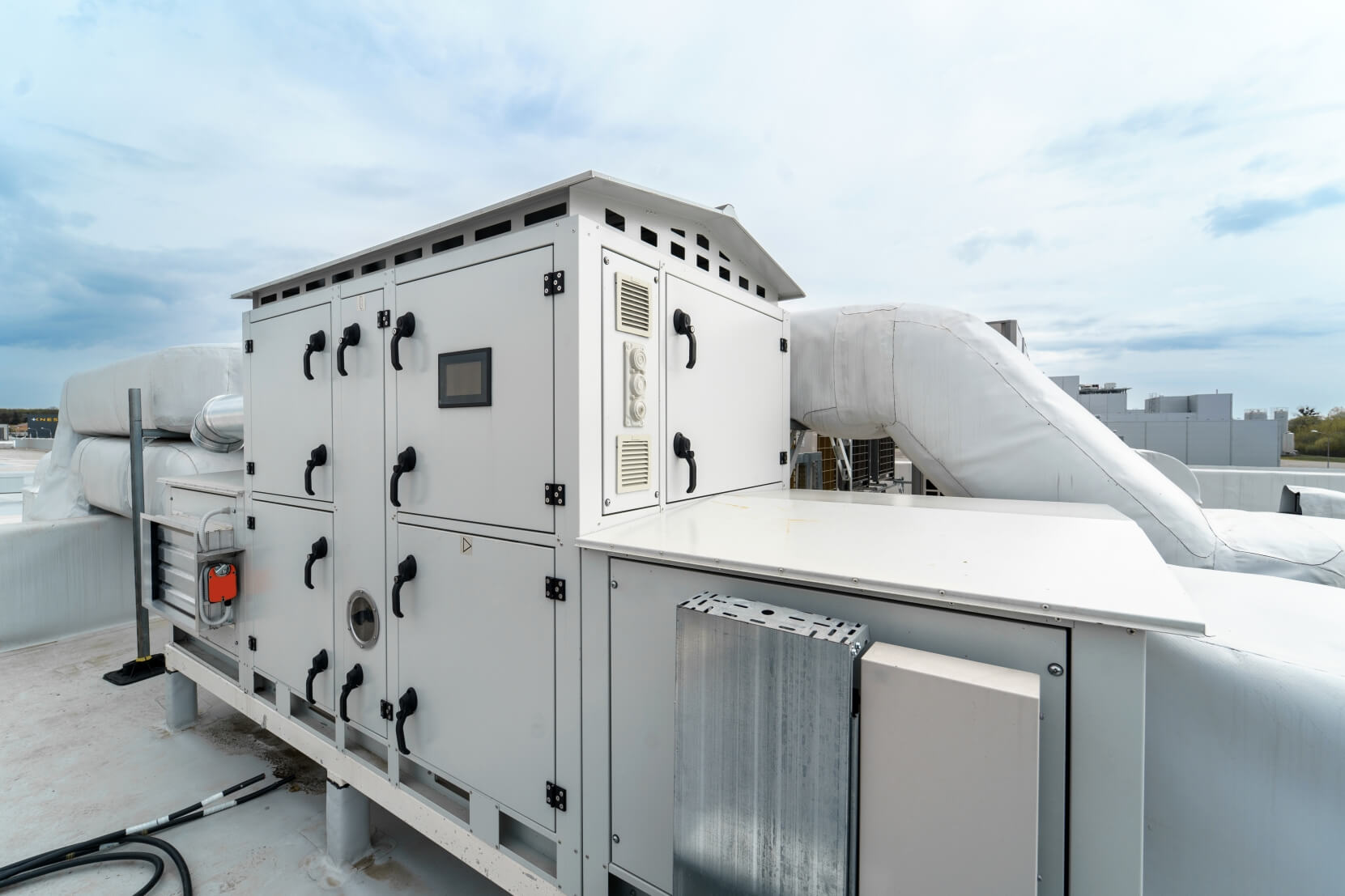 HVAC electrical power installation on industrial factory roof